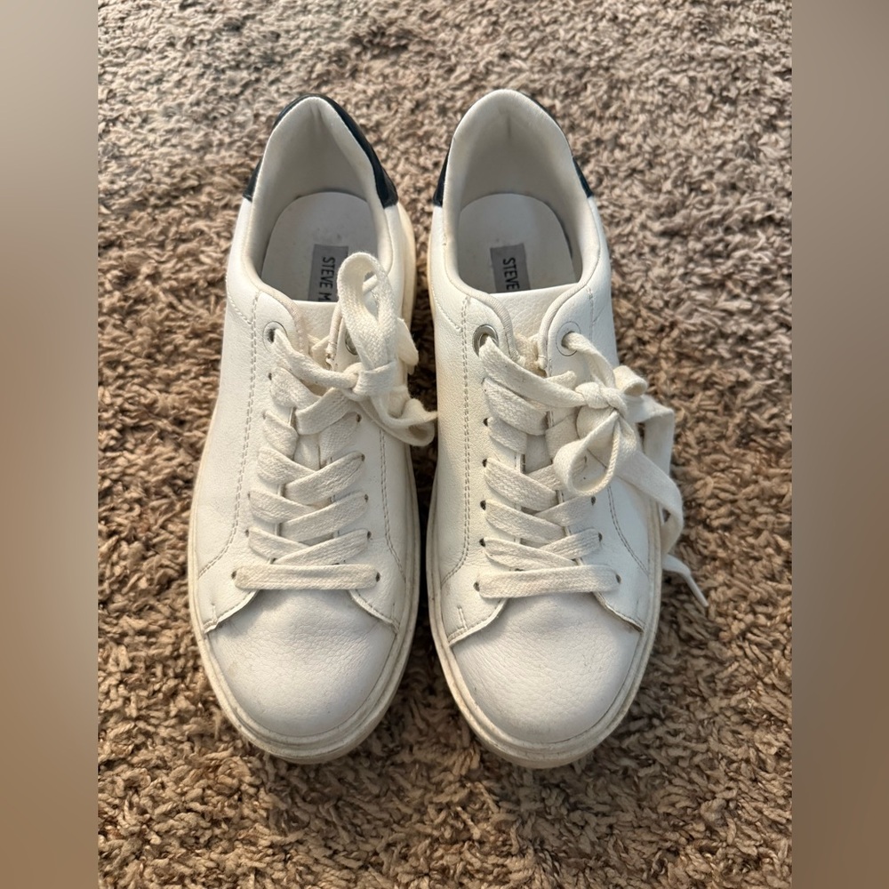 Steven Madden sneakers! Cute & versatile - they go with every outfit.